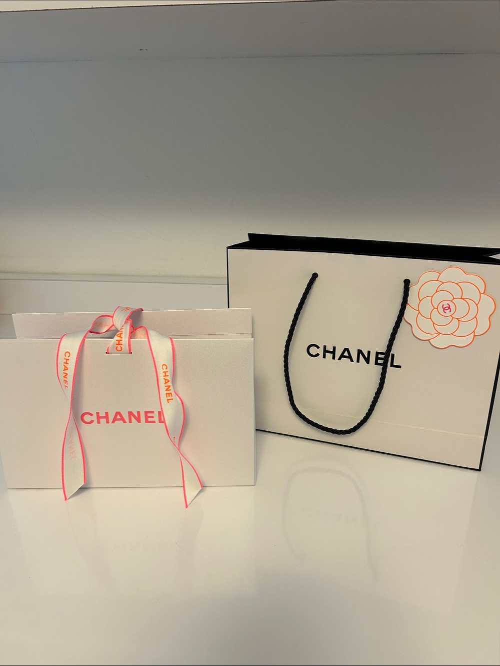 CHANEL White Gift Bags with Pink Logo and Ribbon